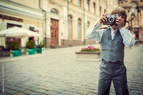 Little boy with a camera