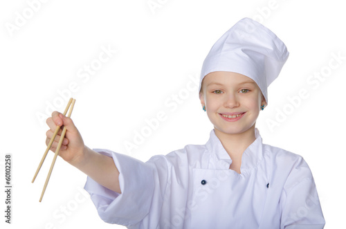 Girl in the form of chef with chopsticks