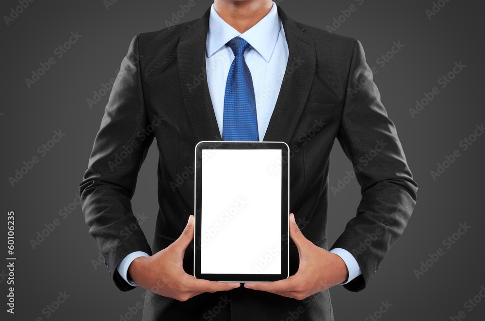 photo of a businessman showing blank tablet PC monitor photo of a businessman showing blank tablet PC monitor