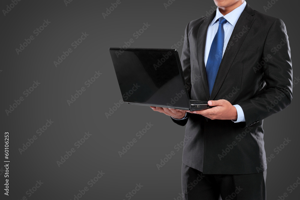 Businessman working on a laptop computer Businessman working on a laptop computer