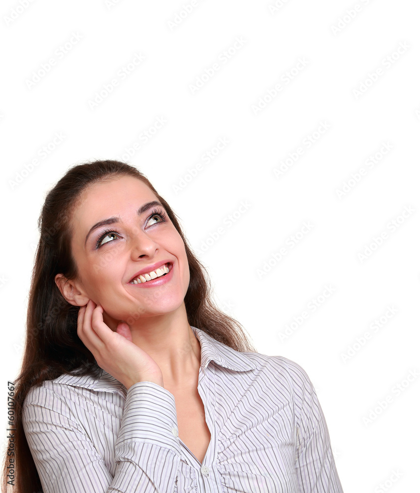 Smiling woman looking above on empty copy space isolated on whit Smiling woman looking above on empty copy space isolated on whit