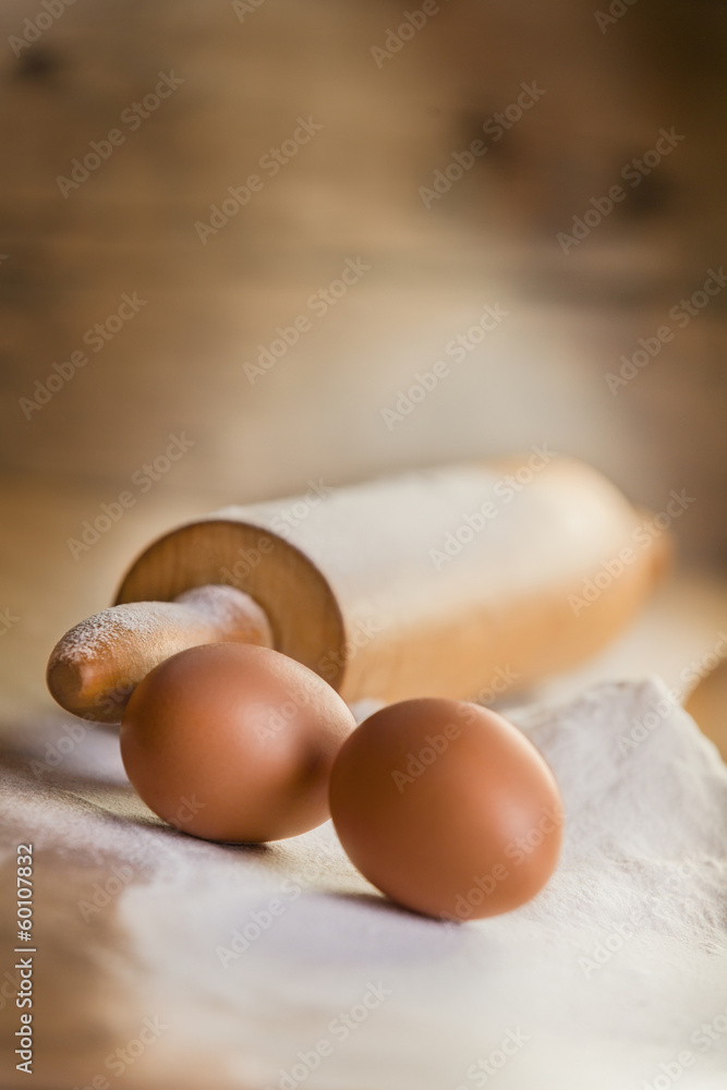 Rustic baking on wood with eggs and flour Rustic baking on wood with eggs and flour