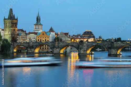 Prague cityscape with Charles bridge in the evening