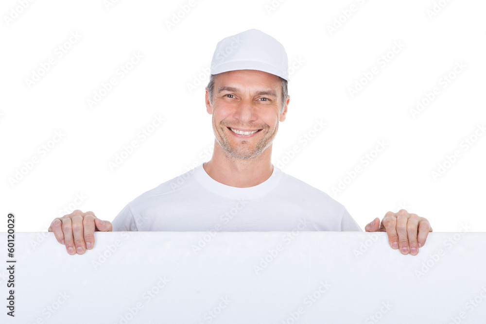 Painter Presenting Blank Placard Painter Presenting Blank Placard