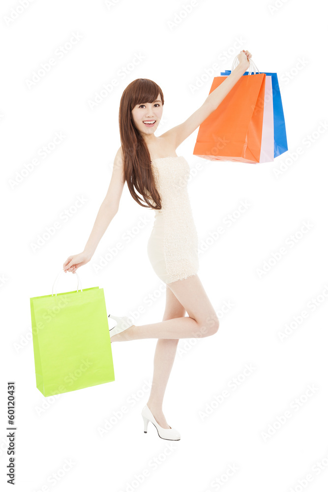 Shopping woman happy smiling holding shopping bags Shopping woman happy smiling holding shopping bags