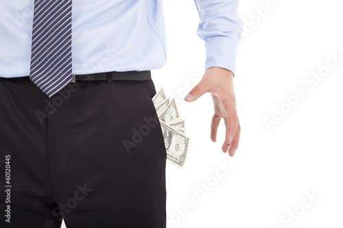 Business man grabbing pocket money over white