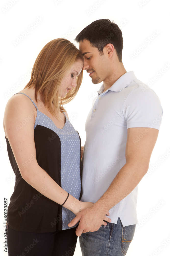 Couple hands and heads together Couple hands and heads together
