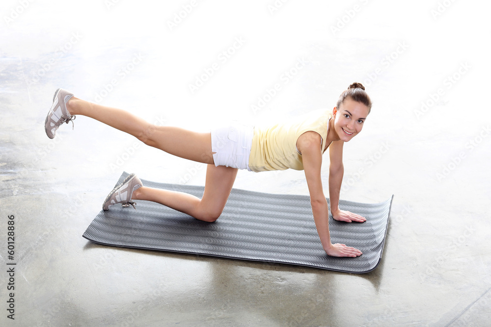 Fototapeta premium ćwiczenia pilates na macie