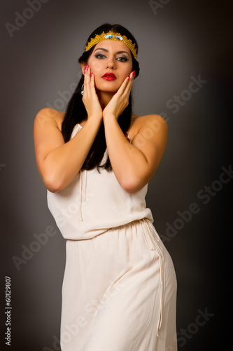 brunette woman in a bright dress