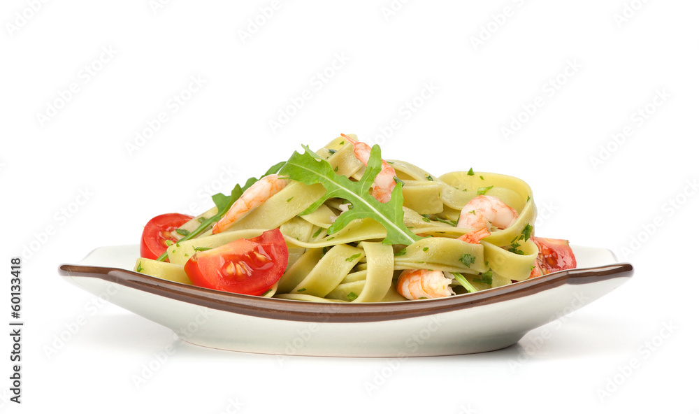 Pasta tagliatelle with shrimp and arugula