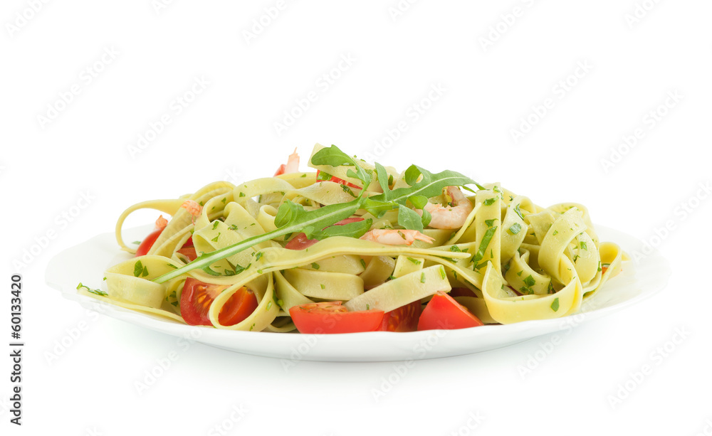 Pasta tagliatelle with shrimp and tomatoes