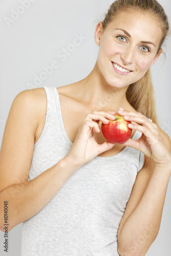 Woman holding an apple