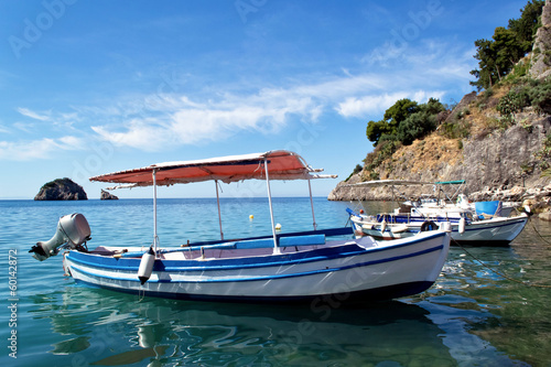 Fishing Boats in a Harbour and a Blue Sky Parga Greece © vician_petar