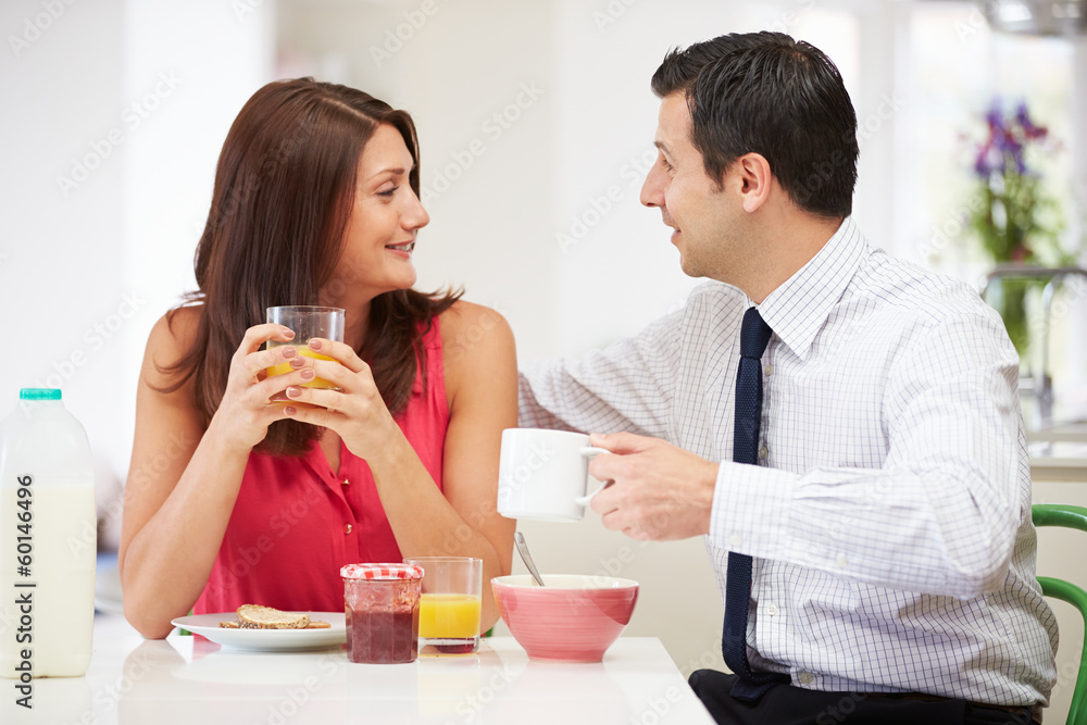 Couple Having Breakfast Before Husband Goes To Work Couple Having Breakfast Before Husband Goes To Work