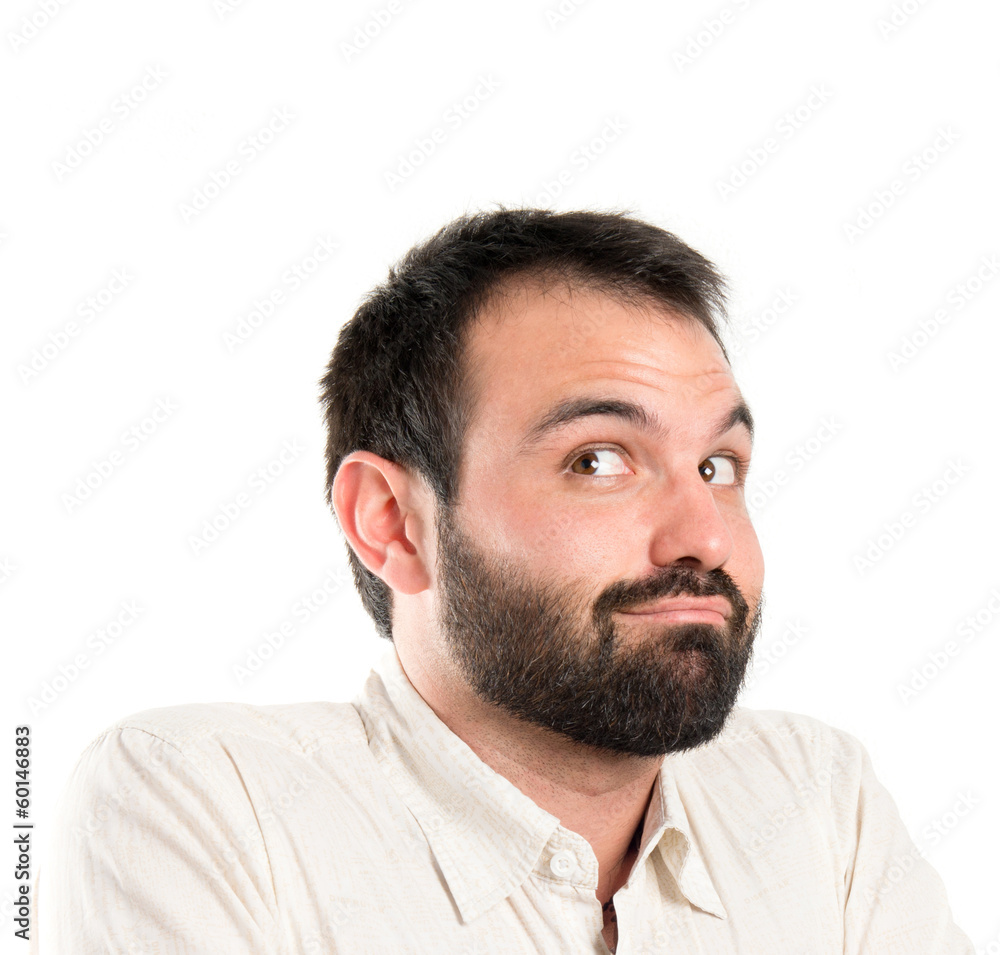 Obraz premium Young man satisfied over white background