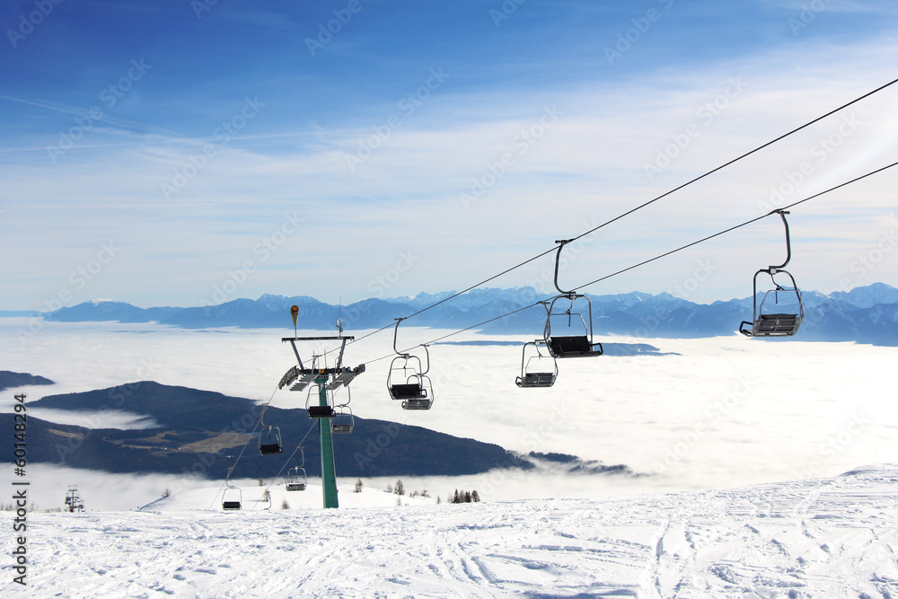 Ski lift and skiers Ski lift and skiers