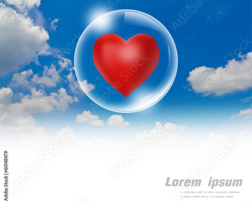 Red heart floating in a bubble in the sky