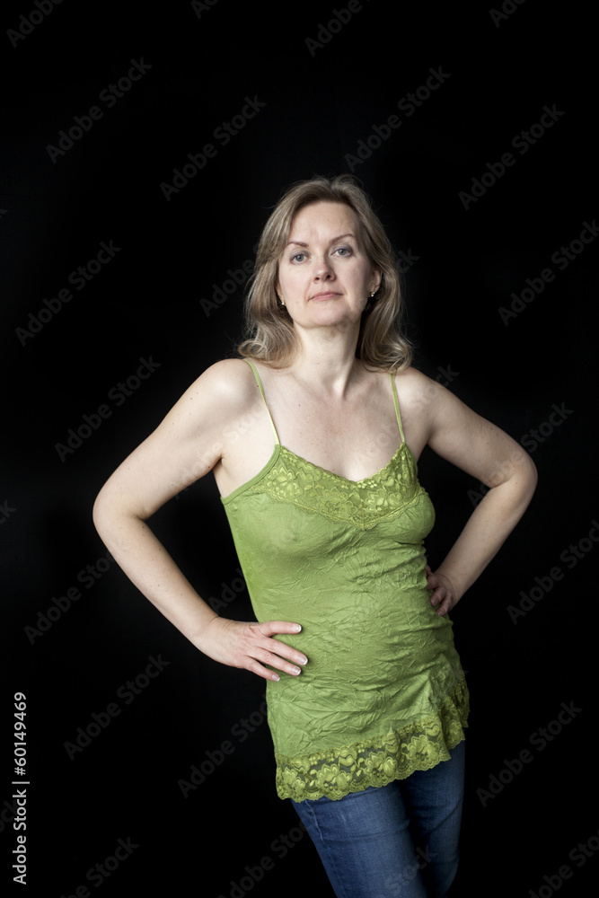 Blonde Woman with Beautiful Blue Eyes on Black Background Blonde Woman with Beautiful Blue Eyes on Black Background