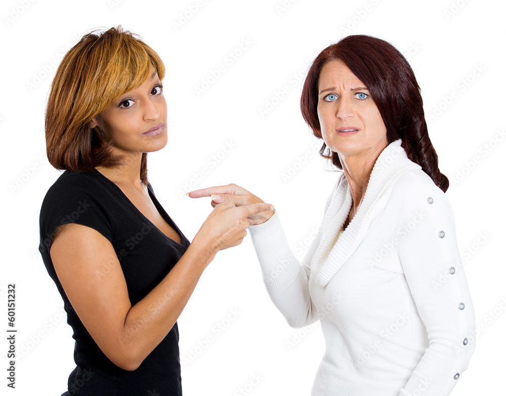 Two angry upset women having arguments frustrated Two angry upset women having arguments frustrated