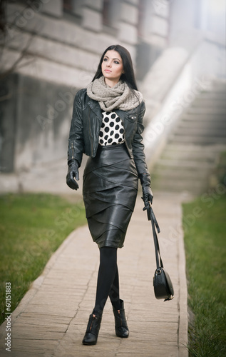 Obraz na płótnie Attractive young woman in a winter fashion shot. Beautiful girl w salonie