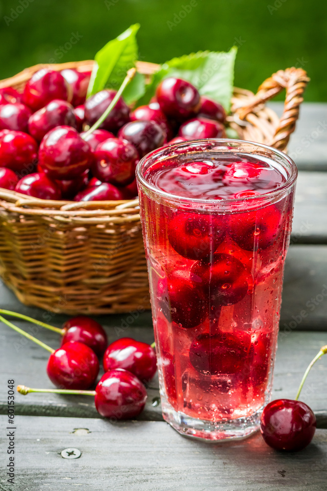Fresh juice made of sweet cherries and ice Fresh juice made of sweet cherries and ice
