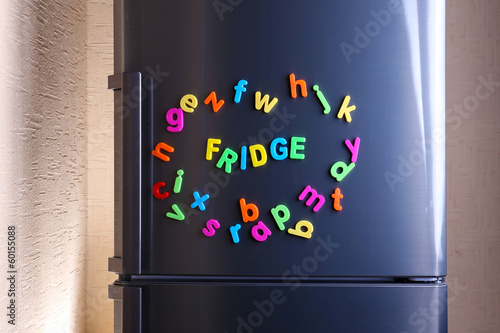 Word Fridge spelled out using colorful magnetic letters