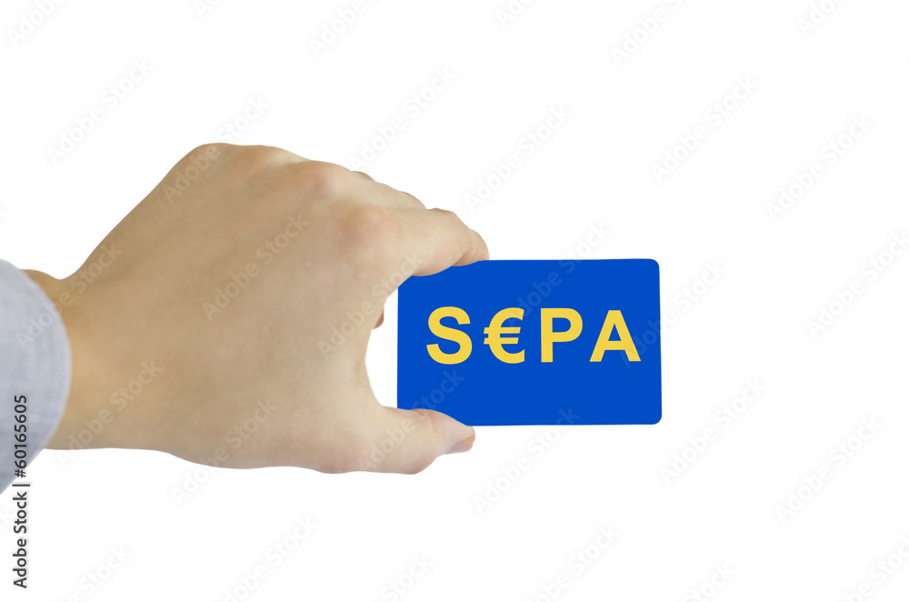 Hand hält eine blaue Bankkarte: SEPA Hand hält eine blaue Bankkarte: SEPA