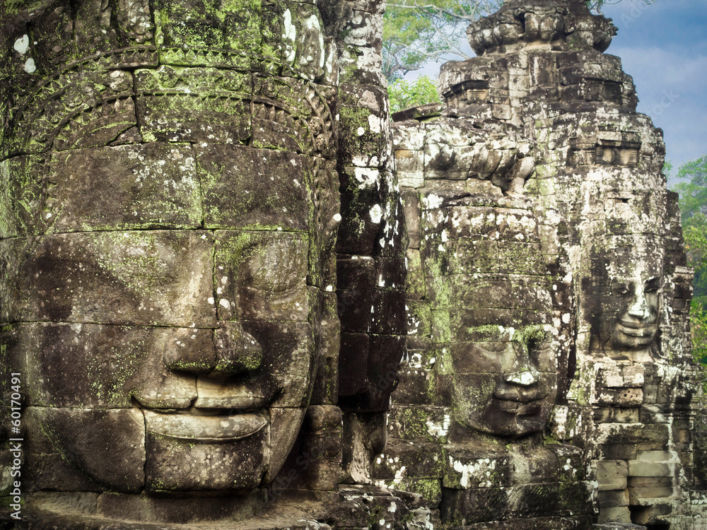 Giant Stone Faces at Bayon Temple in Angkor, Cambodia