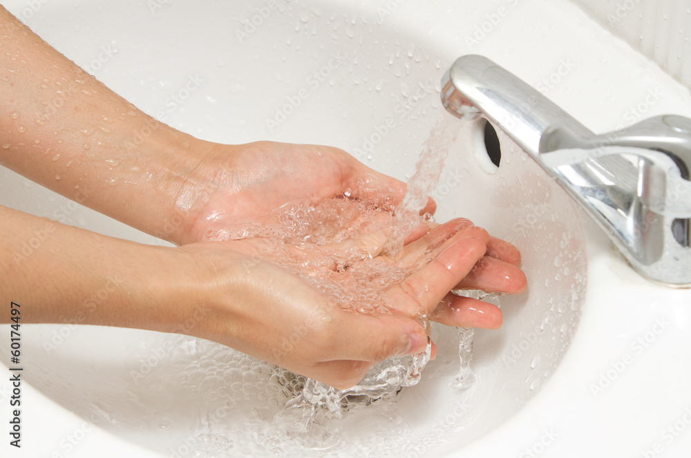 Fototapeta premium Washing hands under flowing tap water