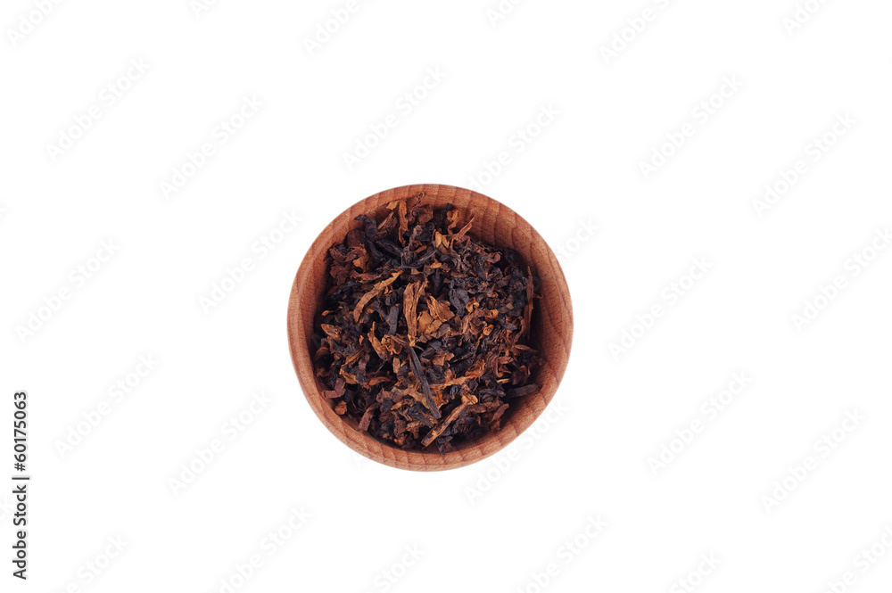 Tobacco in the wooden bowl Tobacco in the wooden bowl