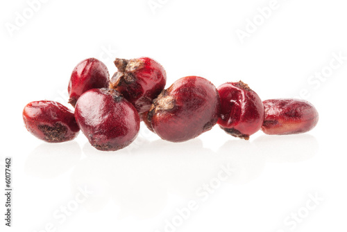 Dried Sumac berries isolated on white background