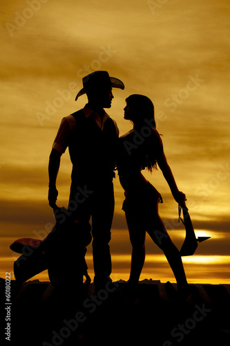 Silhouette cowboy indian saddle club down