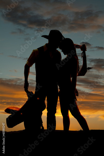 Silhoeutte cowboy Indian saddle