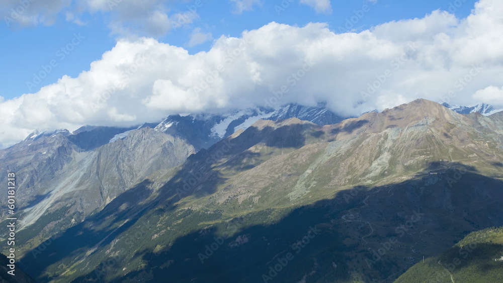 Motion time lapse cloud shadows across mountain ridges Motion time lapse cloud shadows across mountain ridges