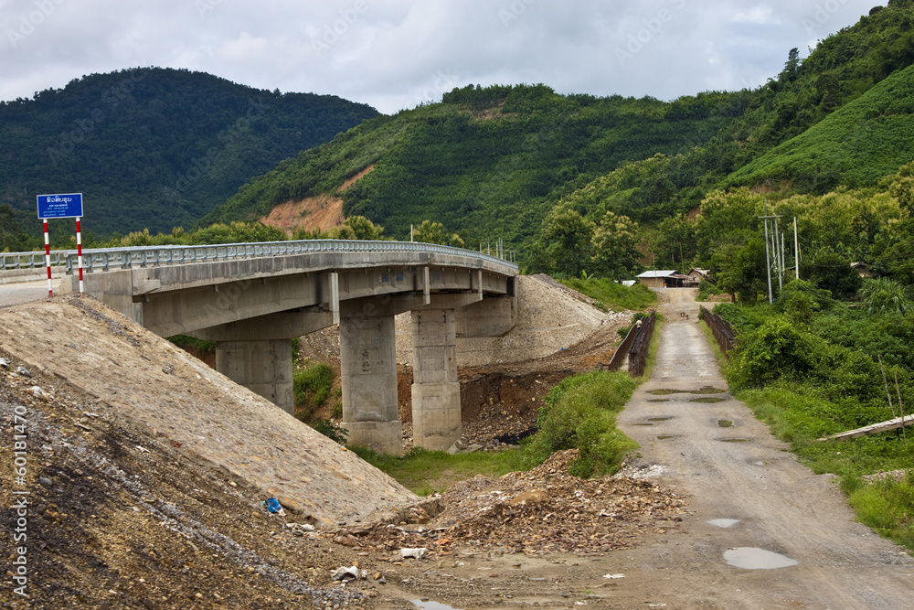 Old and new bridge in northern Laos