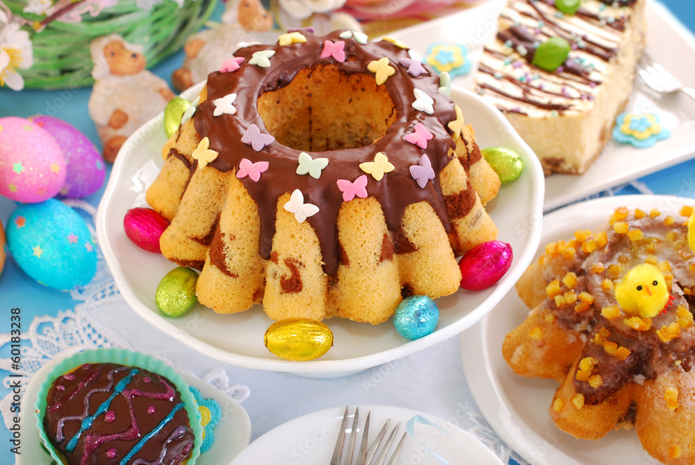 Obraz premium easter marble ring cake with butterfly sprinkles