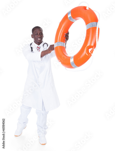 Male Doctor Holding Inflatable Tube