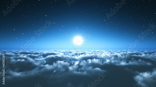 Night flight above the clouds