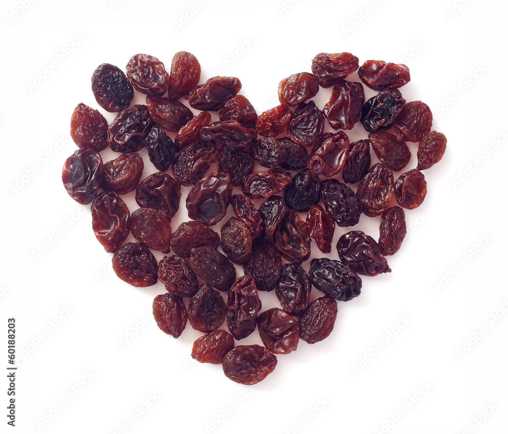 heart shape from raisins on white background heart shape from raisins on white background