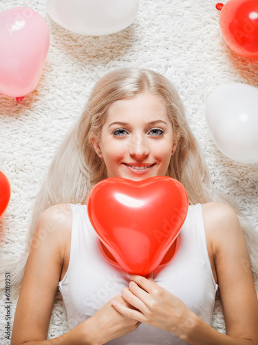 Blonde woman with balloons