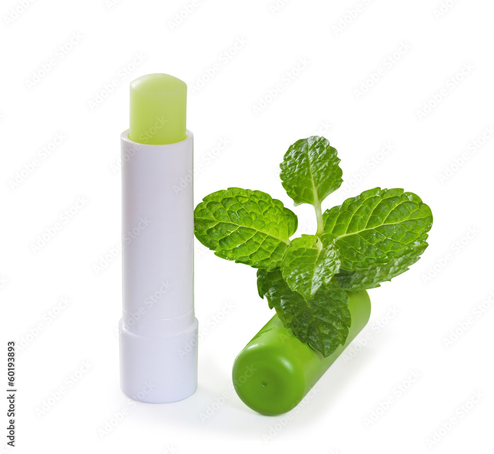 Hygienic lipstick with mint leaves. Isolate on white background Hygienic lipstick with mint leaves. Isolate on white background