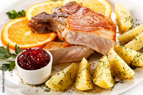 Bilde på lerret Grilled steak, boiled potatoes and lingonberry jam