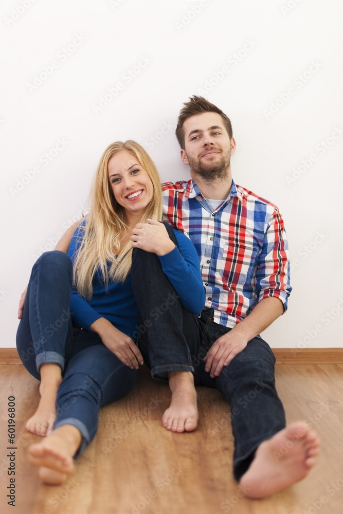 Portrait of relaxed couple on floor Portrait of relaxed couple on floor