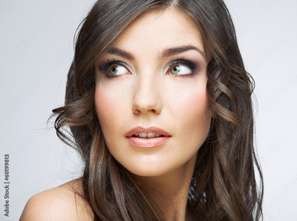 Obraz premium Woman face close up beauty portrait. Girl with long hair lookin