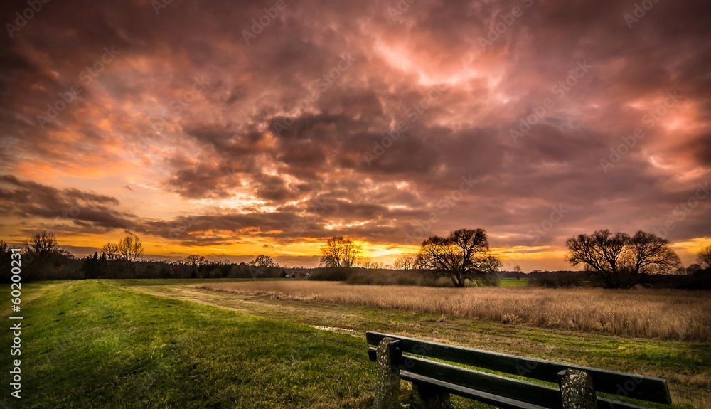 A warm sunset over a countryside landscape scenery