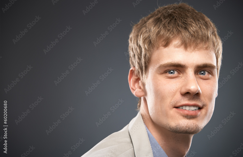 Businessman isolated studio portrait on gray Businessman isolated studio portrait on gray