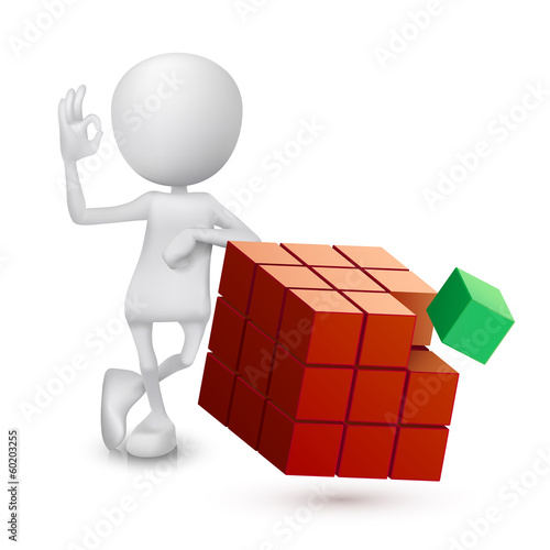 3d man showing okay hand sign with a magic cube