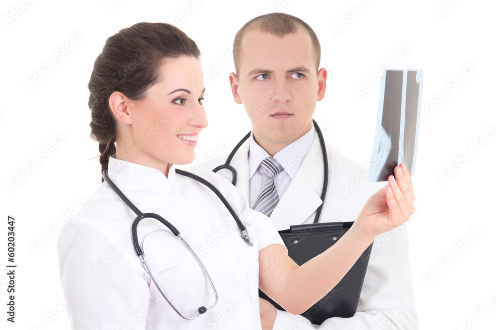 young female and male doctors with xray isolated on white young female and male doctors with xray isolated on white
