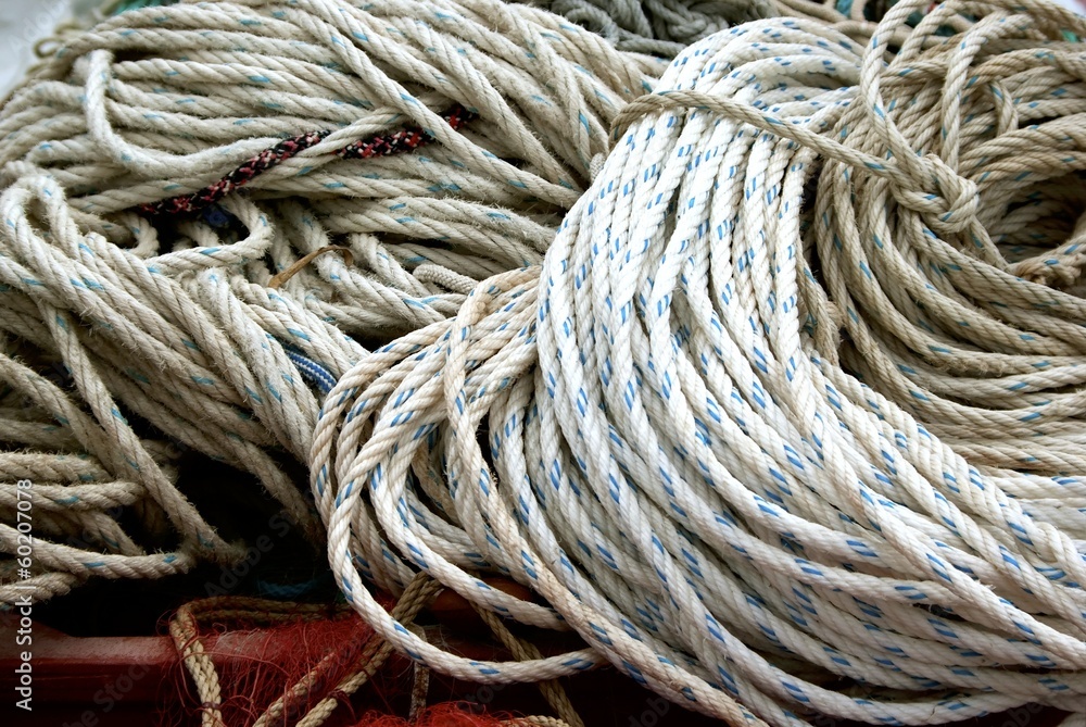 Tied bundles of mooring rope.