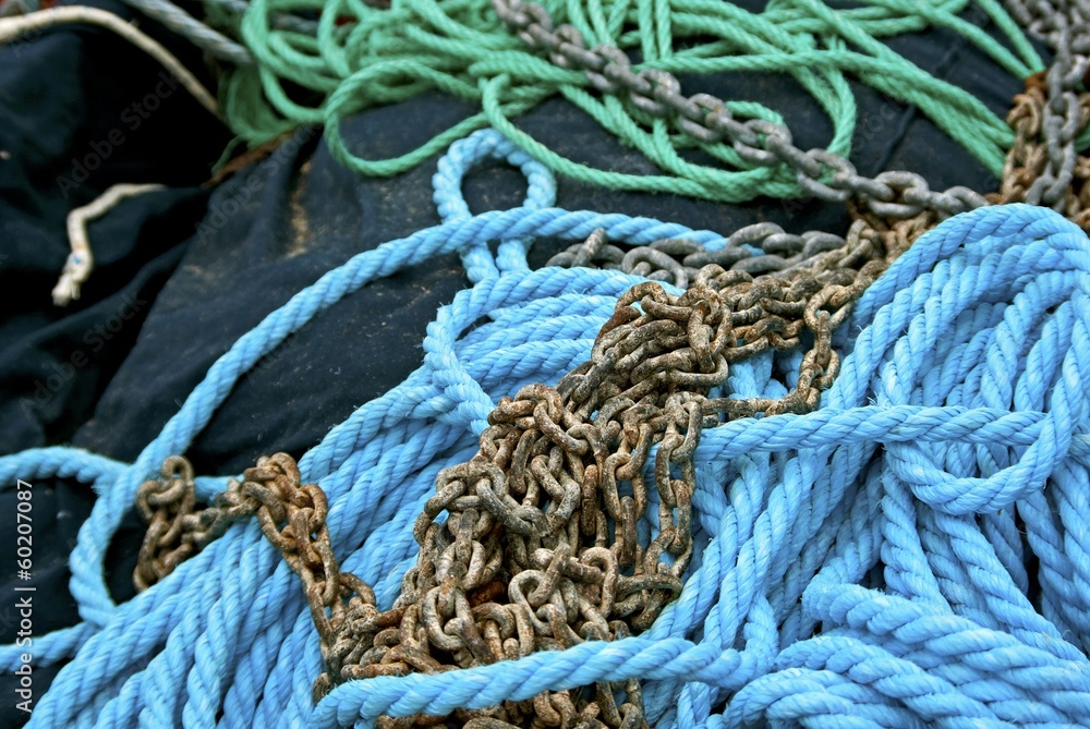 Heap of mooring rope and metal chain.